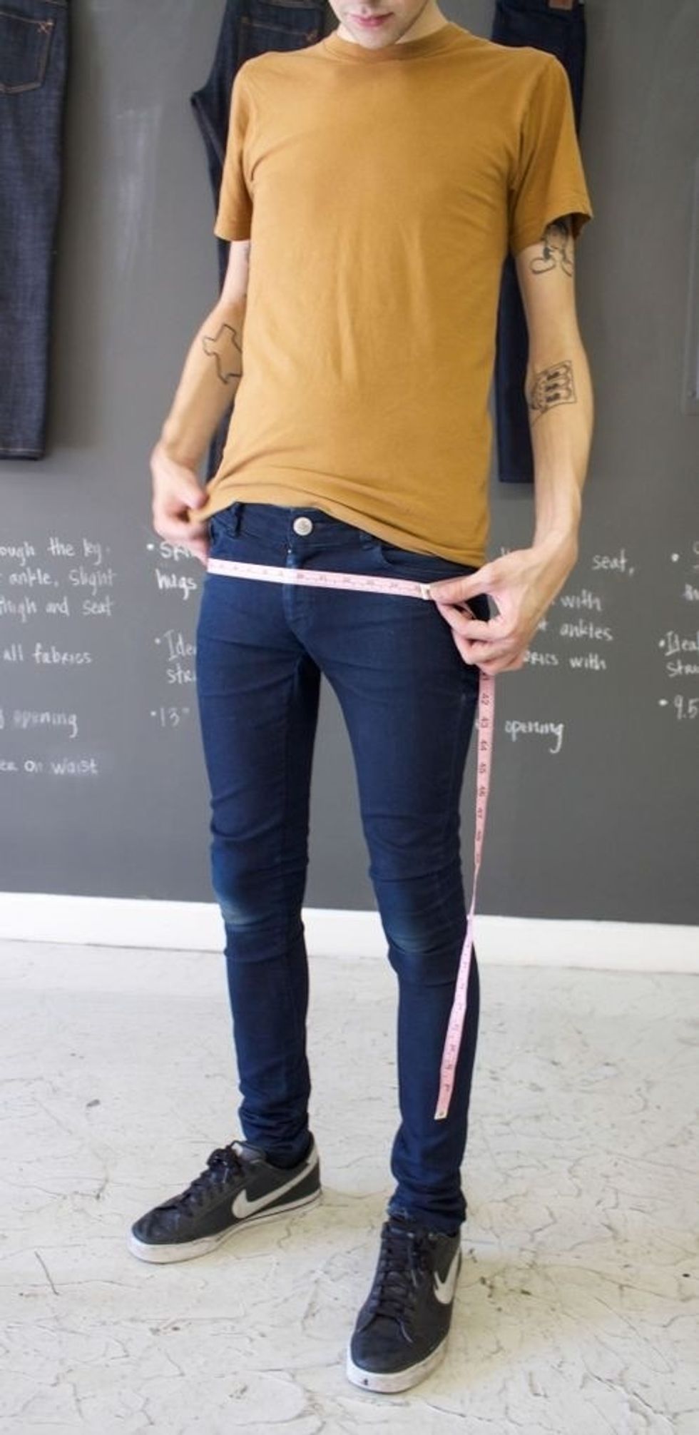 Hip step 2 - Once you figure out the point of measure, wrap measuring tape around hip area. Make sure to wrap around the widest part of your backseat