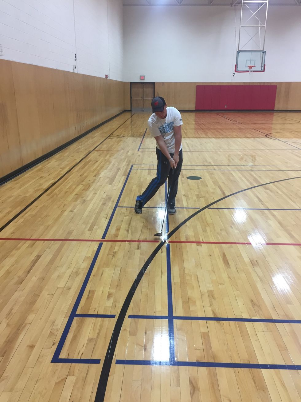 Hips come through first allowing the club head to follow. Naturally the right heel comes off the ground