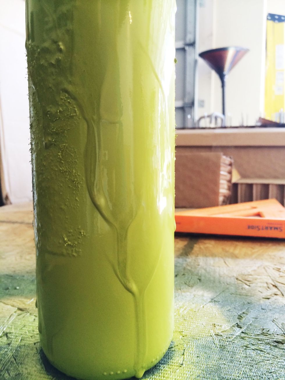 Hit a few places all over for a few seconds to allow the paint to pool and then drip down your bottle.