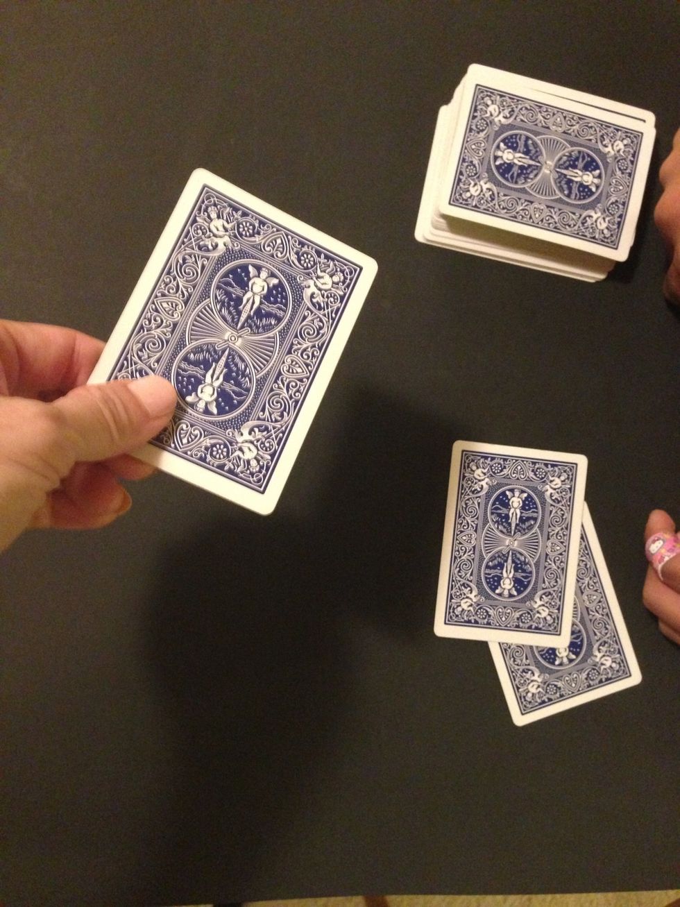 Hit the cards till the card on the bottom is left.