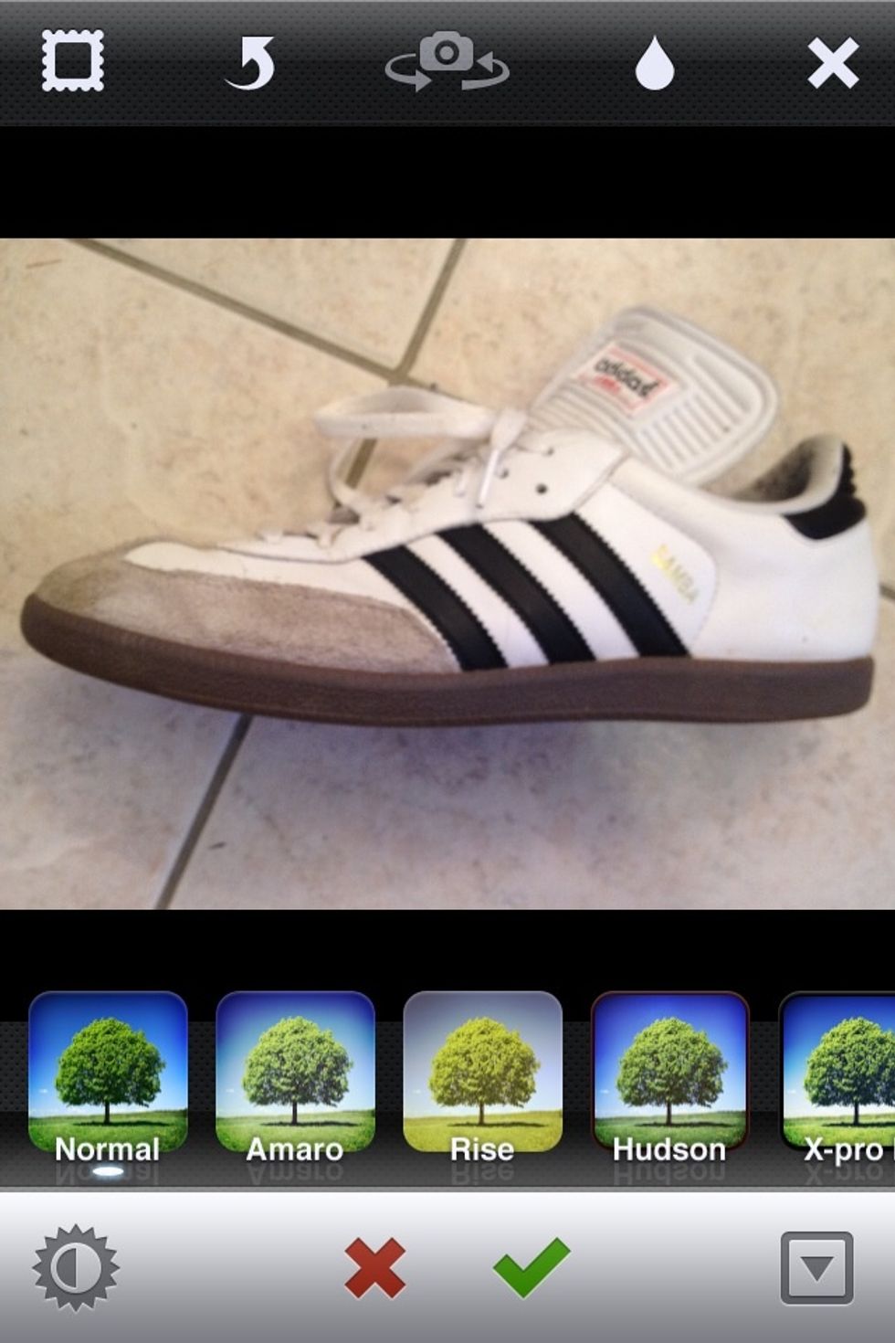 Hit the middle camera button to take you to this and snap a picture or choose from your gallery. Use the editing tools to change pictures.