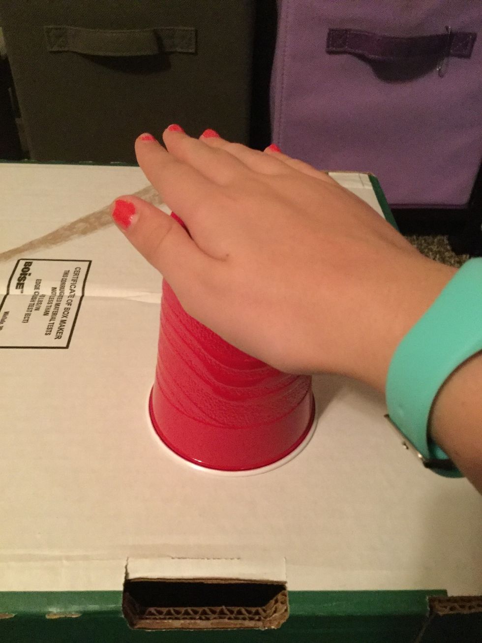 Hit the top of the cup w/ your right hand. Pause.