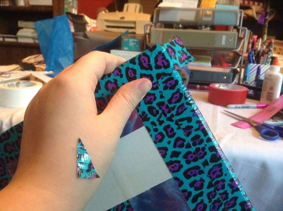 Hold down while folding over the top flap.