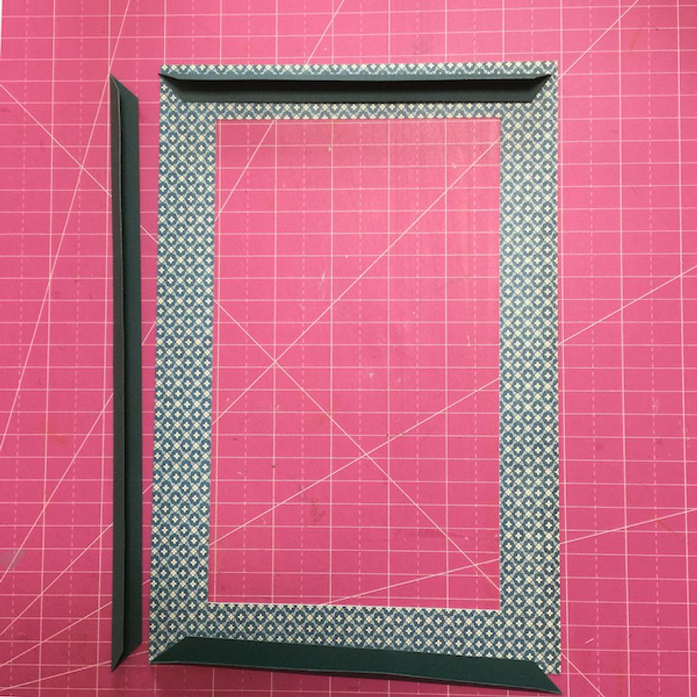 Hold in half and cut the conners then paste to window