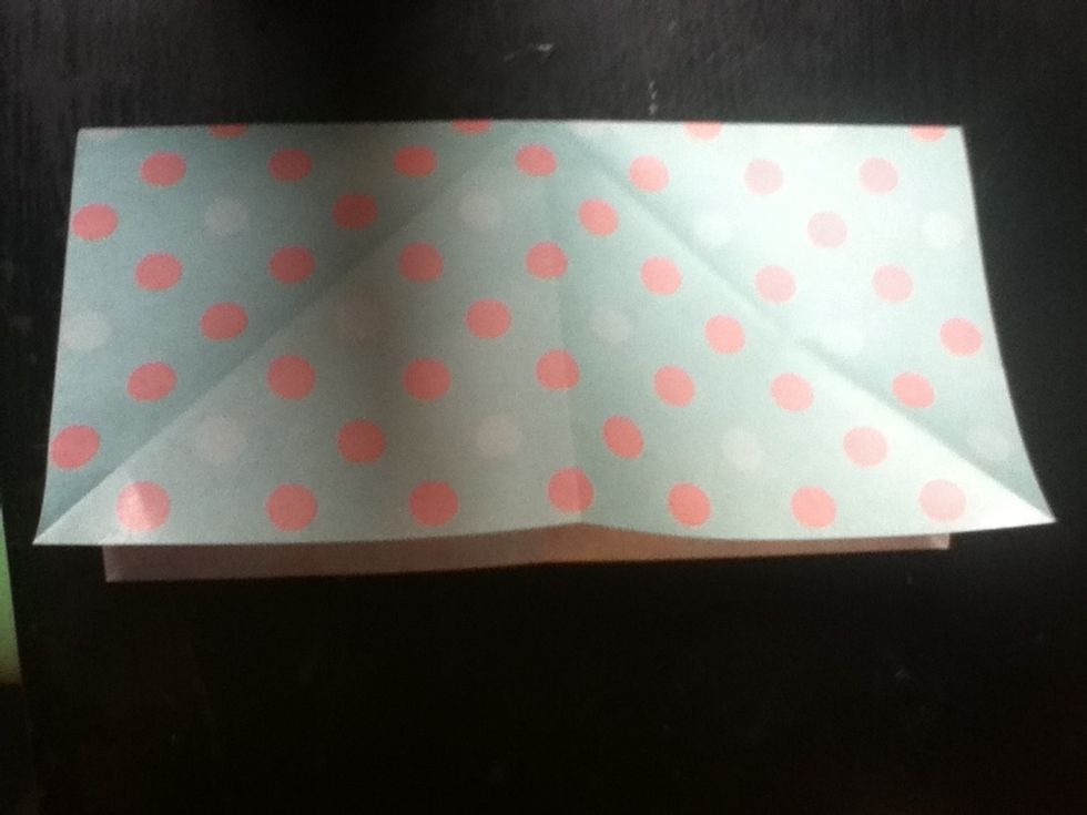 Hold it in half in a rectangular fashion. Either way is fine.