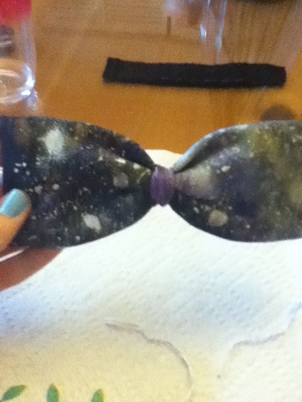 Hold on place with a rubber band.