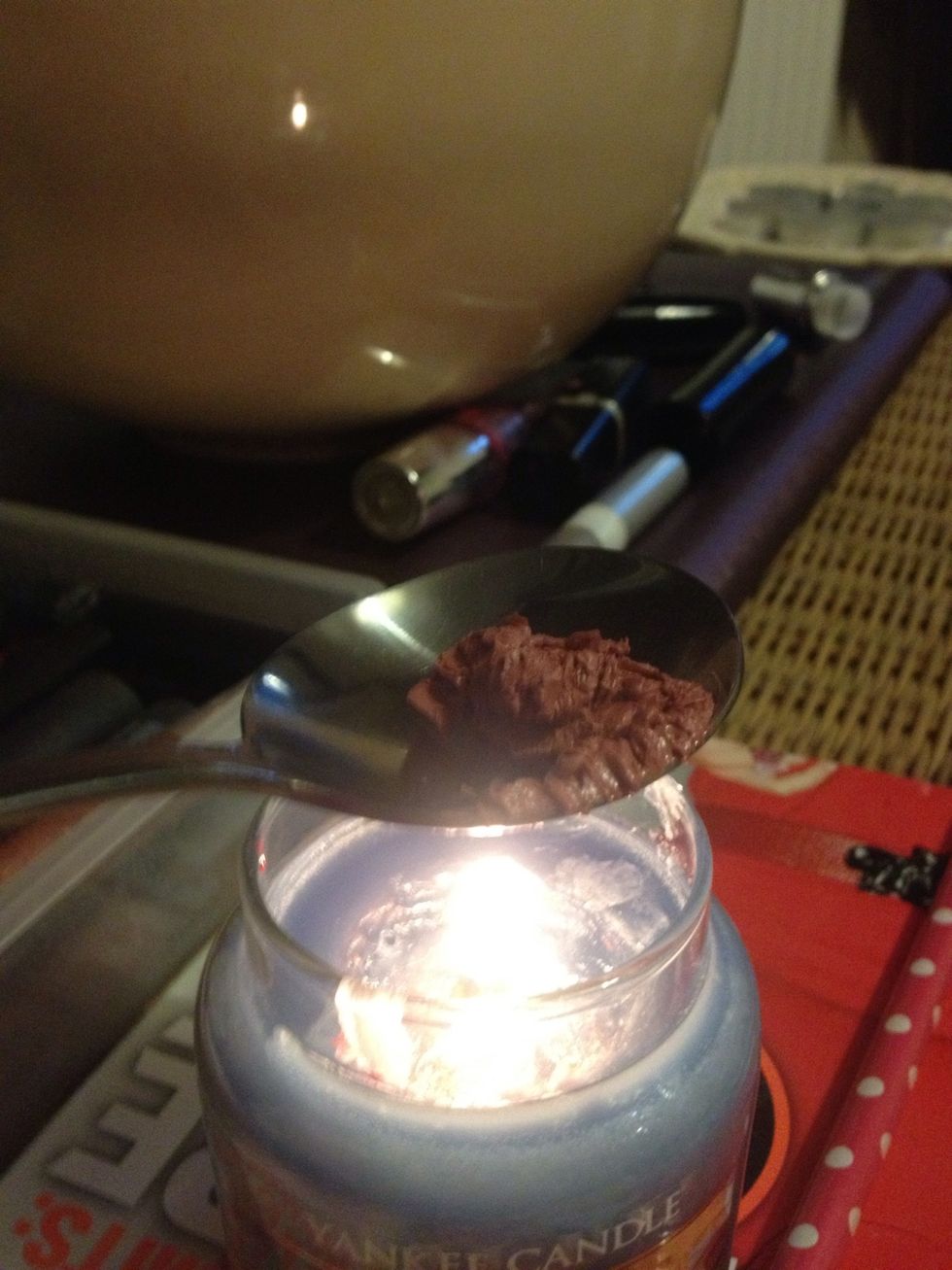 Hold over your candle not too close though! You don't want the lipstick to boil
