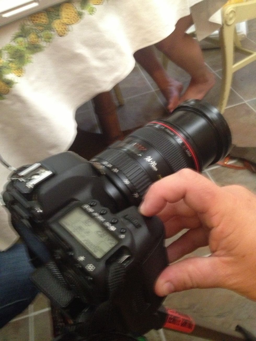 Hold shutter to focus the camera on subject after they're seated and camera set up.
