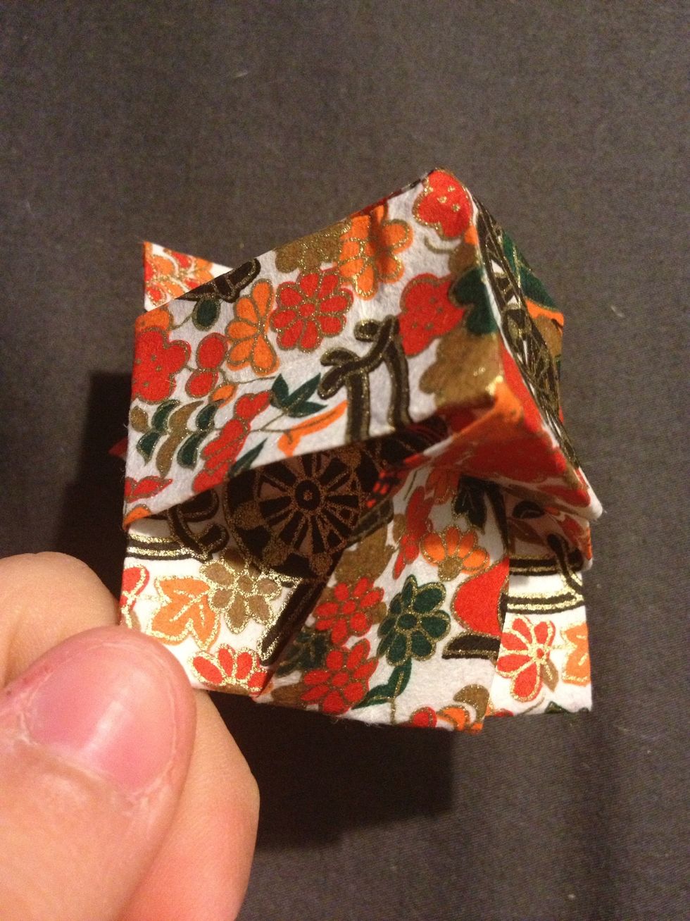 Hold the place where my finger is and don't let go there. The other places, pull, and it should open up
