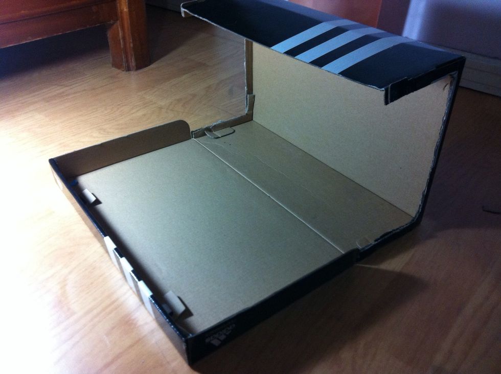 Hold the shoe box as such. Yes, it's upside down.