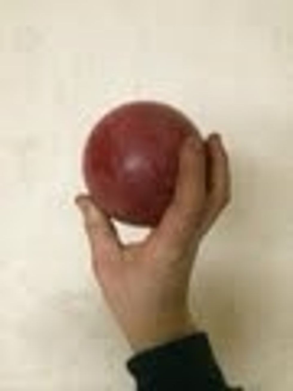 Hold the shot-put like this.