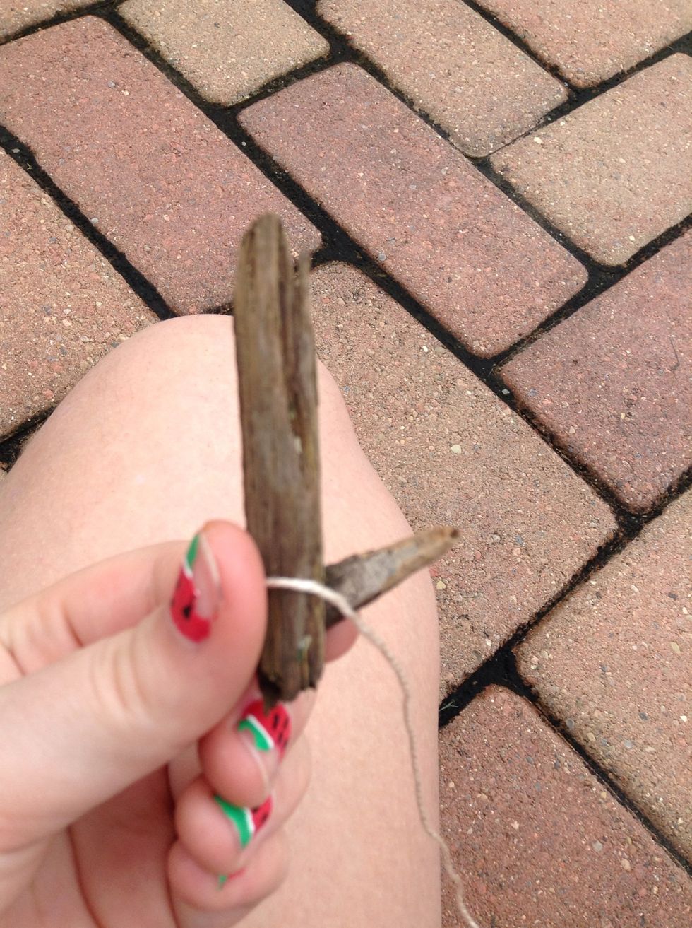 Hold the string like so