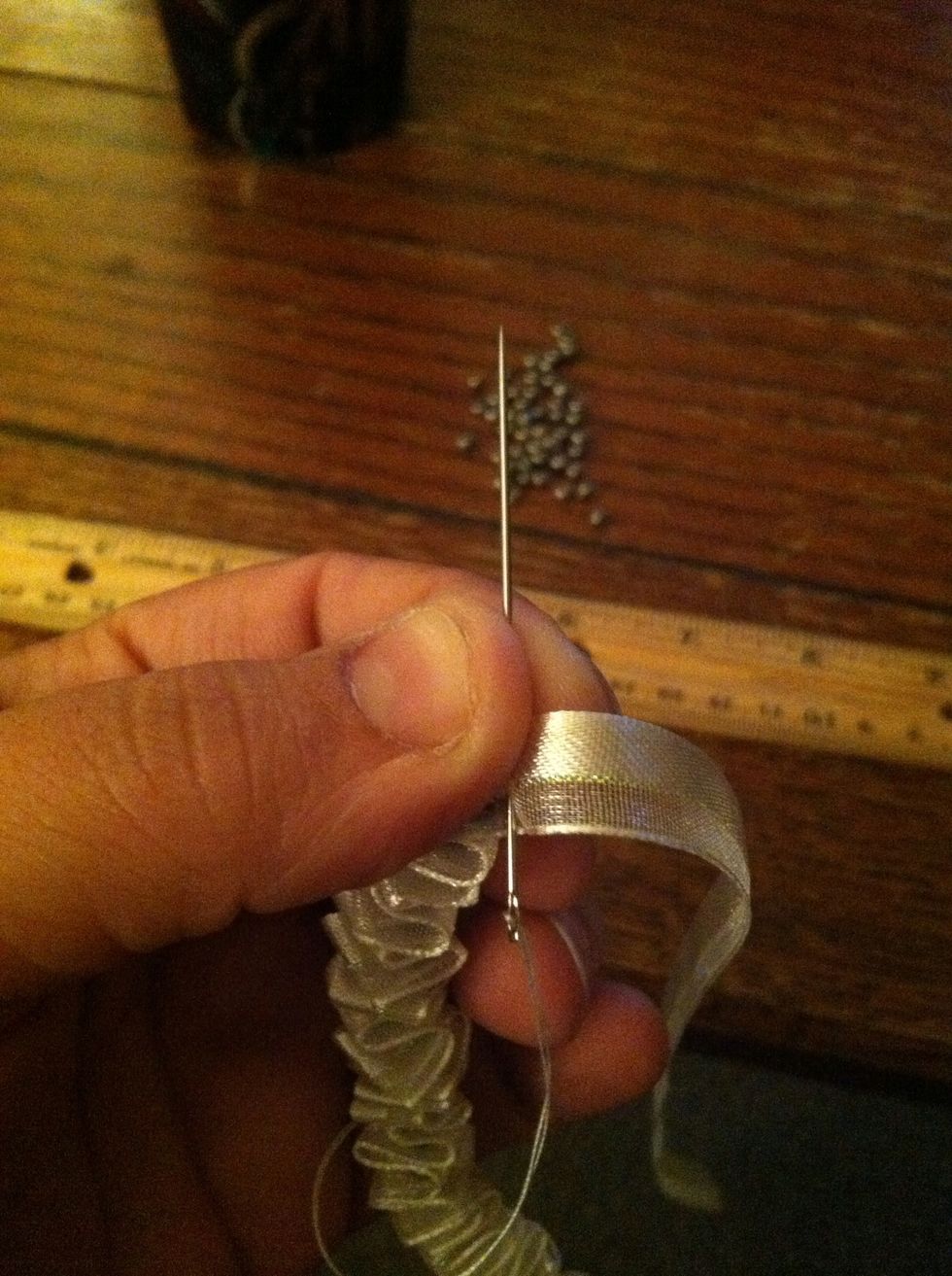 Hold the thread wrap firmly but gently.