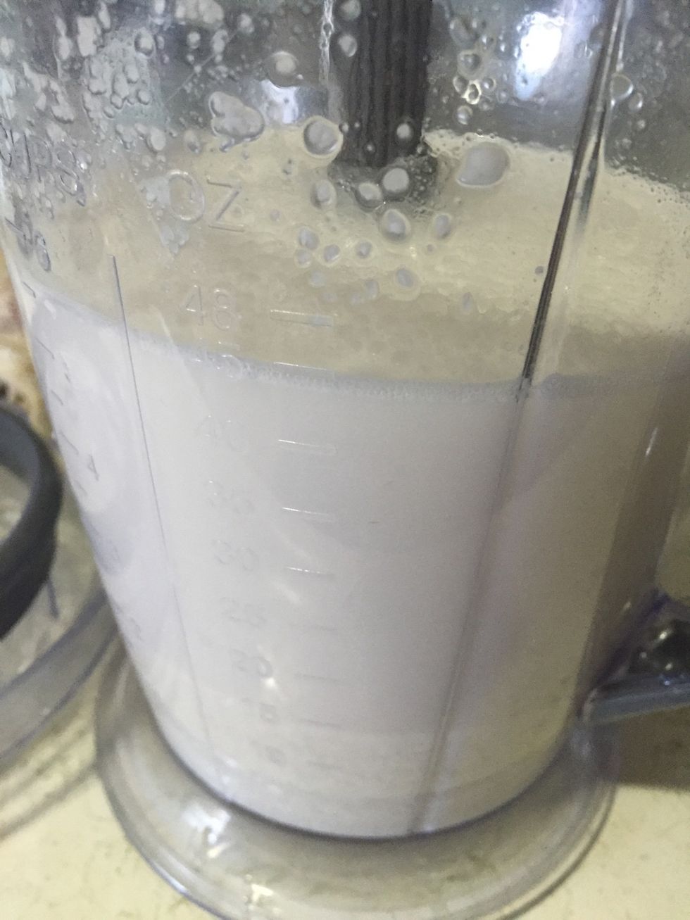 Hold your cinnamon stick, snap it in a piece and throw it in a blender. Pour all the rice and water in a blender. Blend until everything soft and smooth.