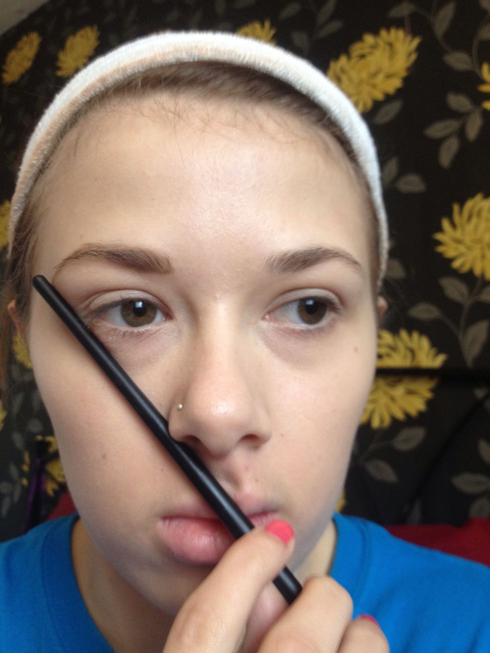 Holding the brush diagonally from the edge of your nose will show you wear the tail of the brow should end