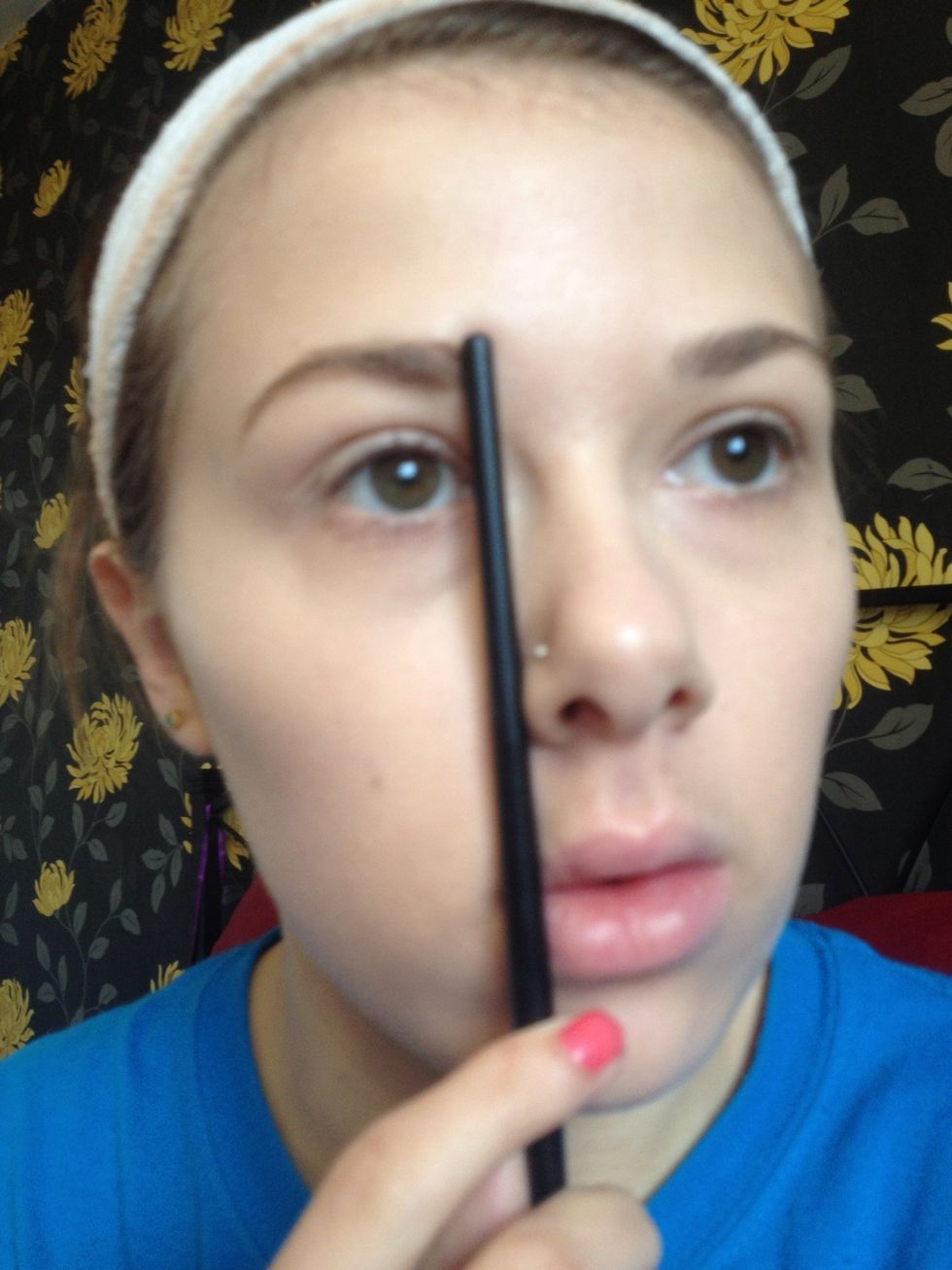 Holding the brush vertically shows we're the brow should begin