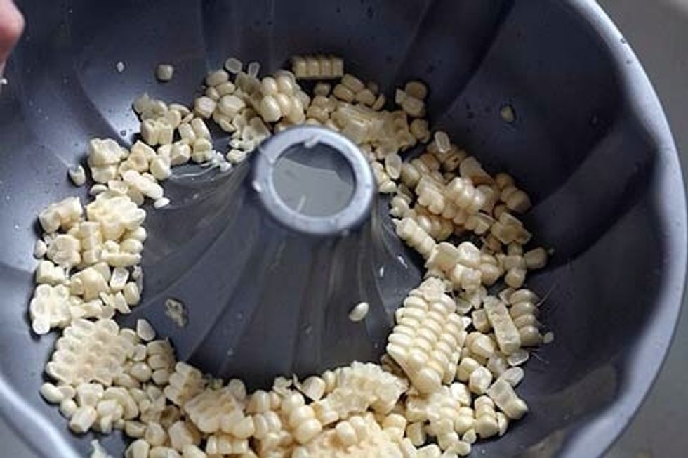 Holding the cob steady, use a sharp knife and make long downward strokes on the cob, separating the kernels from the cob. Ya-taaaaaaaaaa