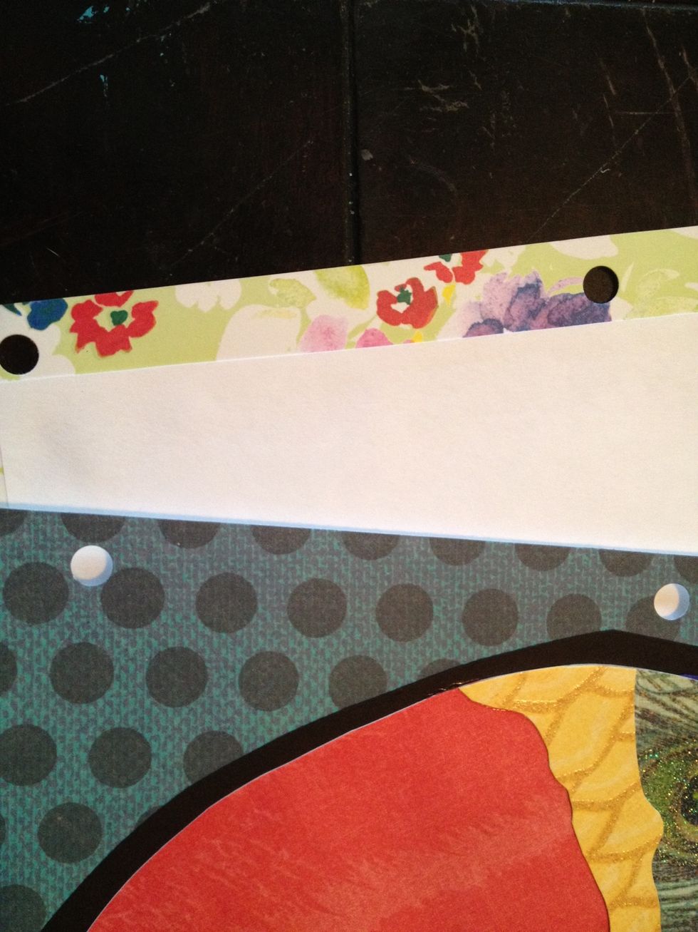 hole punch the left side of both cards; if you do them at the same time, it will assure the holes will line up.