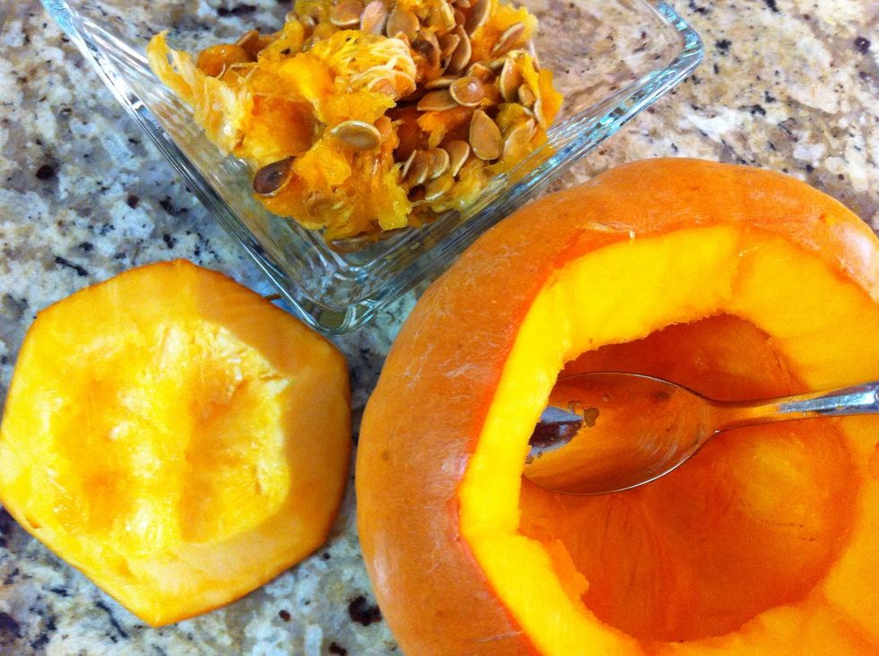 Hollow oat a 2-3 pound heirloom pumpkin with a spoon. Save seeds for roasting and "guts" for compost or chicken/duck food.