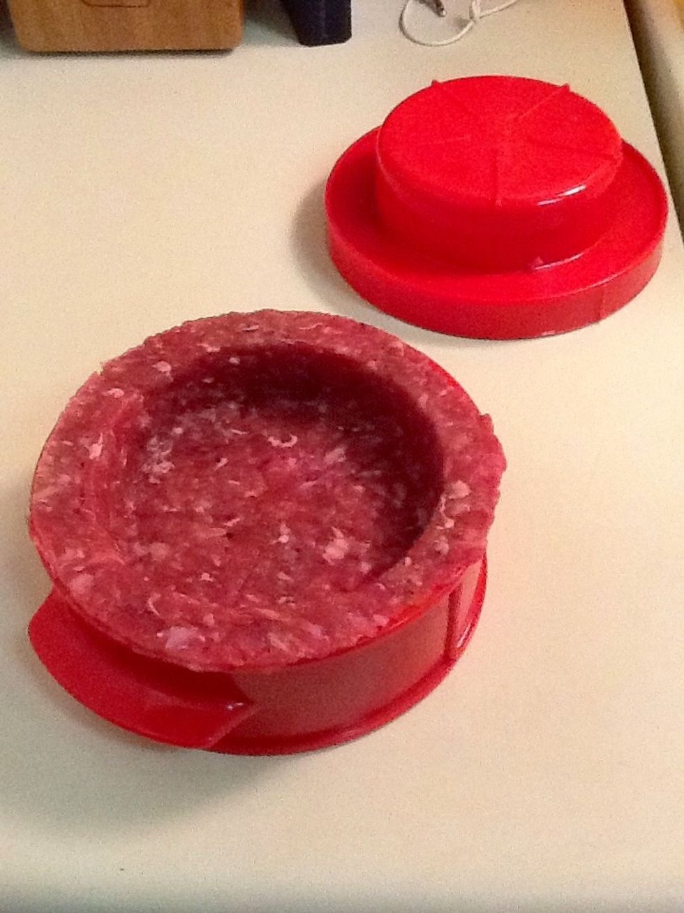 Hollow out the center of your burger (burger presses have this feature)