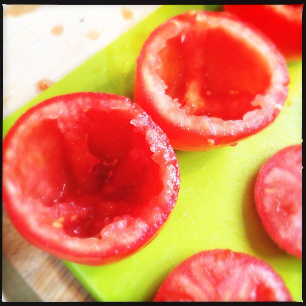 Hollow the tomatoes, but save the inside; we'll be needing that later on \ud83d\ude04
