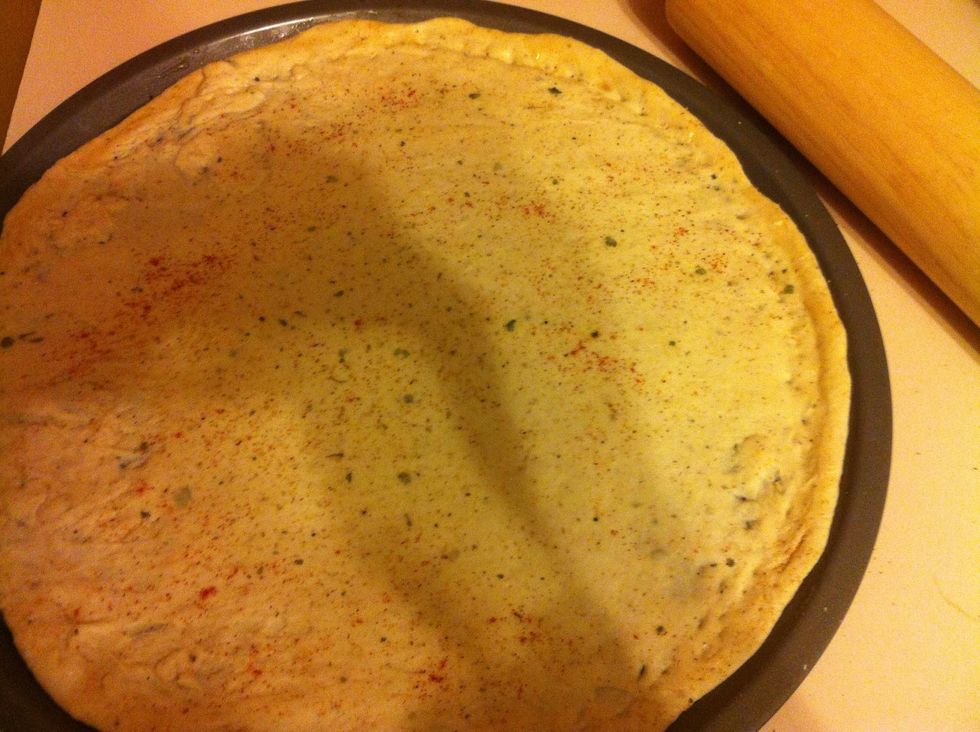 Homemade dough: flour, salt, yeast, 100 degree water, olive oil, sugar, salt, oregano, black pepper. Roll out very thin and spread out