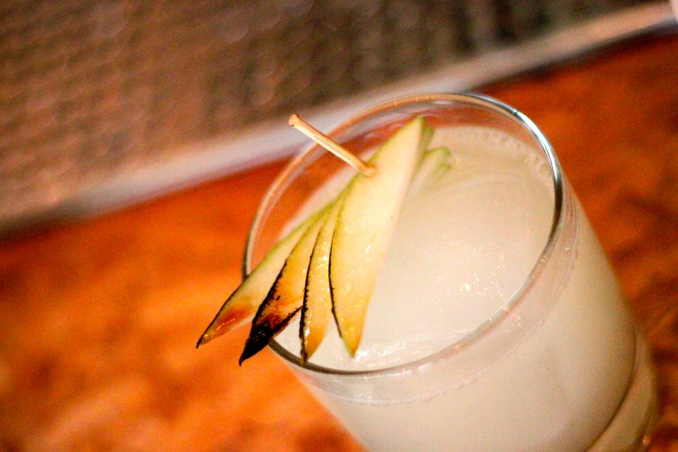 Homemade pear liquour is a perfect choice for a Fall cocktail. Not only is it seasonal, but it has a viscosity and richness that's a pleasure to drink. Absinthe, gin, and lime add a refreshing edge.