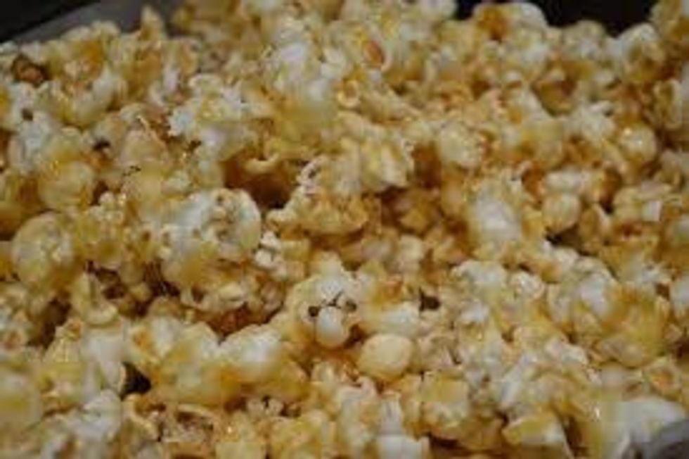 Honey popcorn is sticky icky and makes EXTREMELY bad stains in your mouth.Also it's very hard to get out of your brackets and can be very embarrassing trying to take out of your mouth in public.
