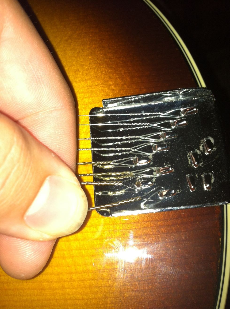 Hook on your new strings