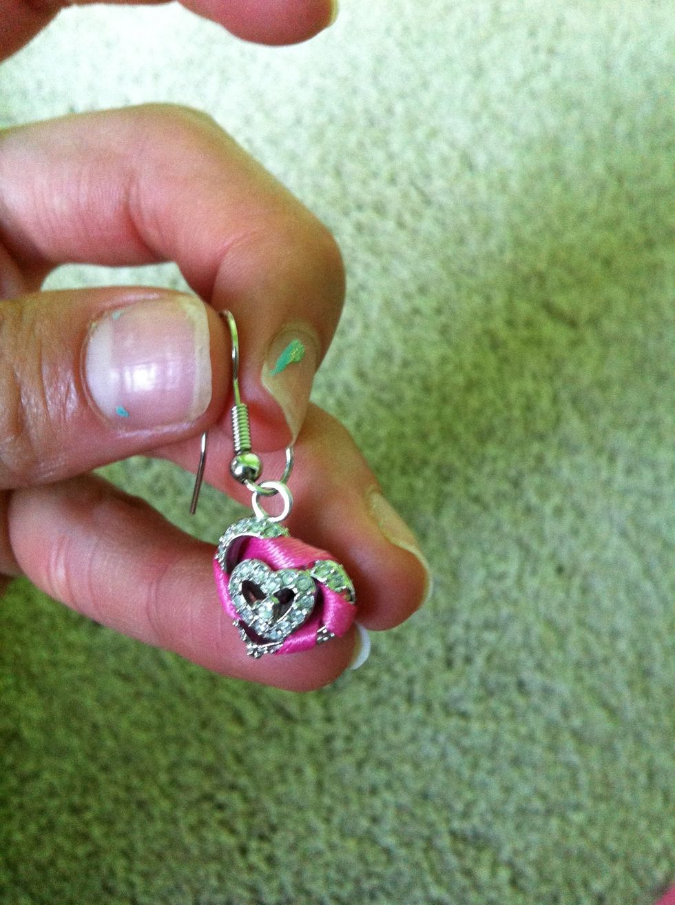 Hook the charm onto the open ring.