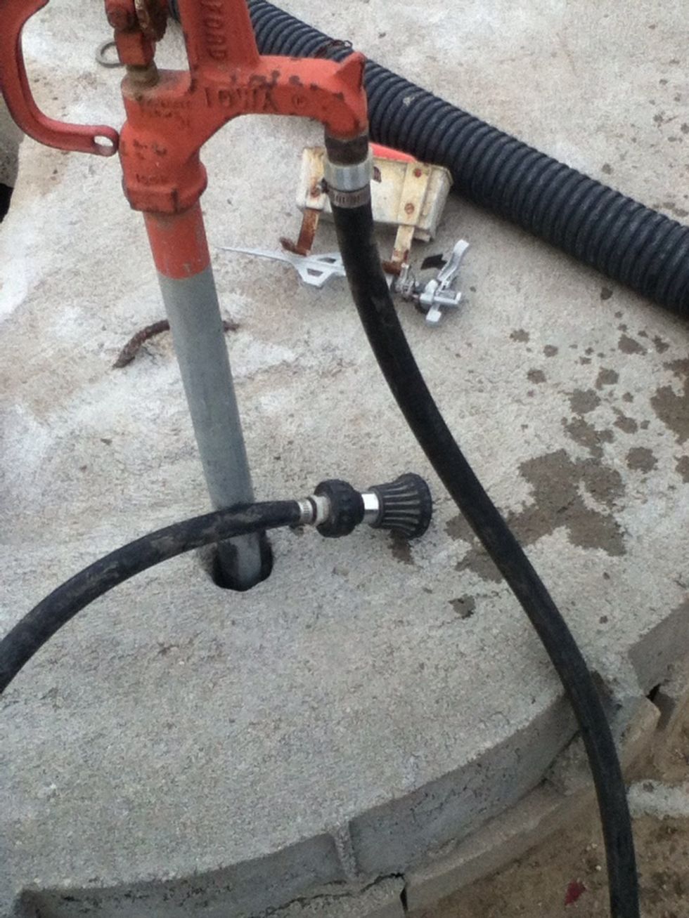 Hook up the hose a nosal to the hydrant.