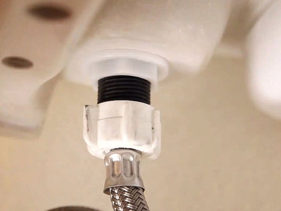 Hook up the water. After securing the water line, turn the water to the toilet back on, and flush the toilet to test the connection.