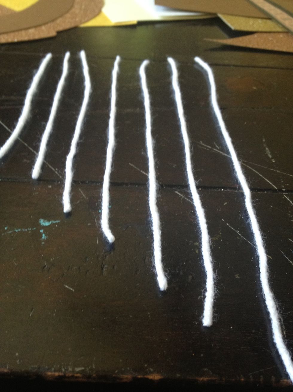 HOPEFULLY you'll have the color string you desire, but I want something more colorful. keeping in mind the size or the card, I cut six strings for the harp varying in size.