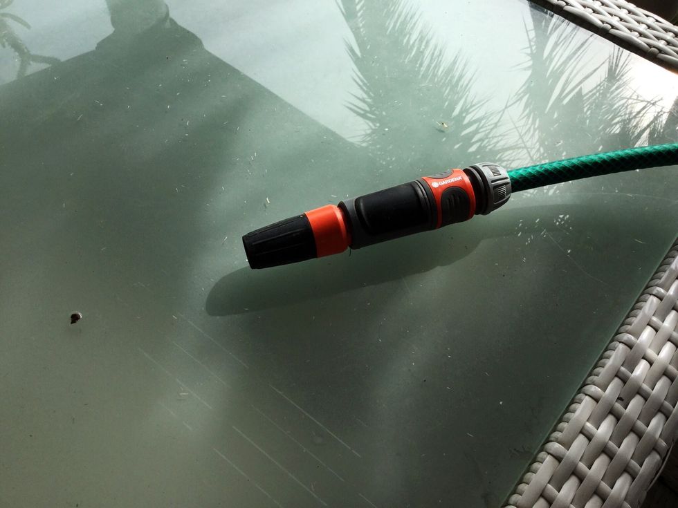 HOSE SPOUT. Connect water spout to hose. Plug in second pond motor in 120 liter bucket to power. Switch on and water till your bucket is empty.