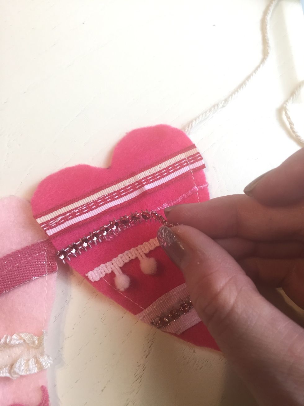 Hot glue any other embellishments. Jewels, buttons, etc.