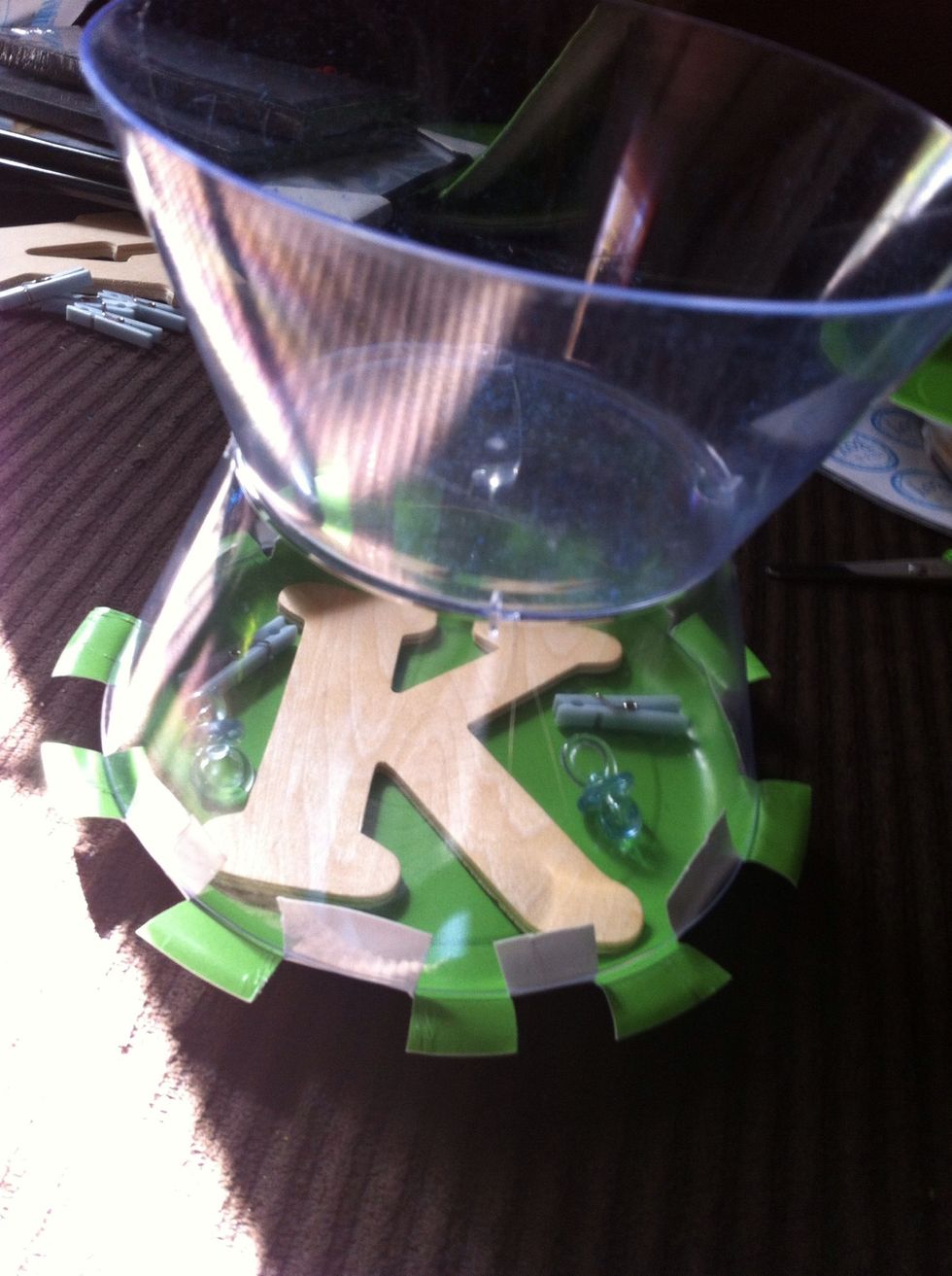 Hot glue bowls together, put every other slit on the inside to hold bowl still.