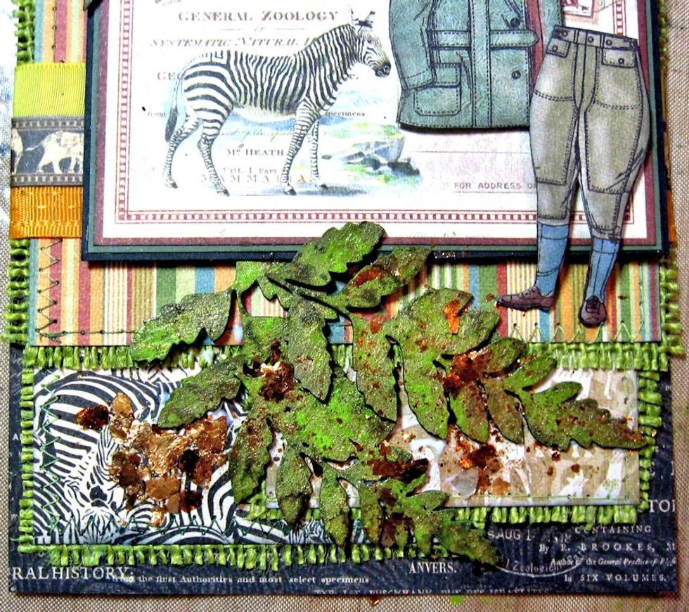 Hot glue in place, as shown. Scribble Art Institute Dries Clear adhesive randomly and add Bronze Mica Chips, as seen here.