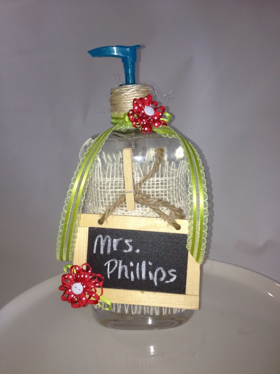 Hot glue mini chalkboard to bottle. I used a mini clothespin for extra charm.