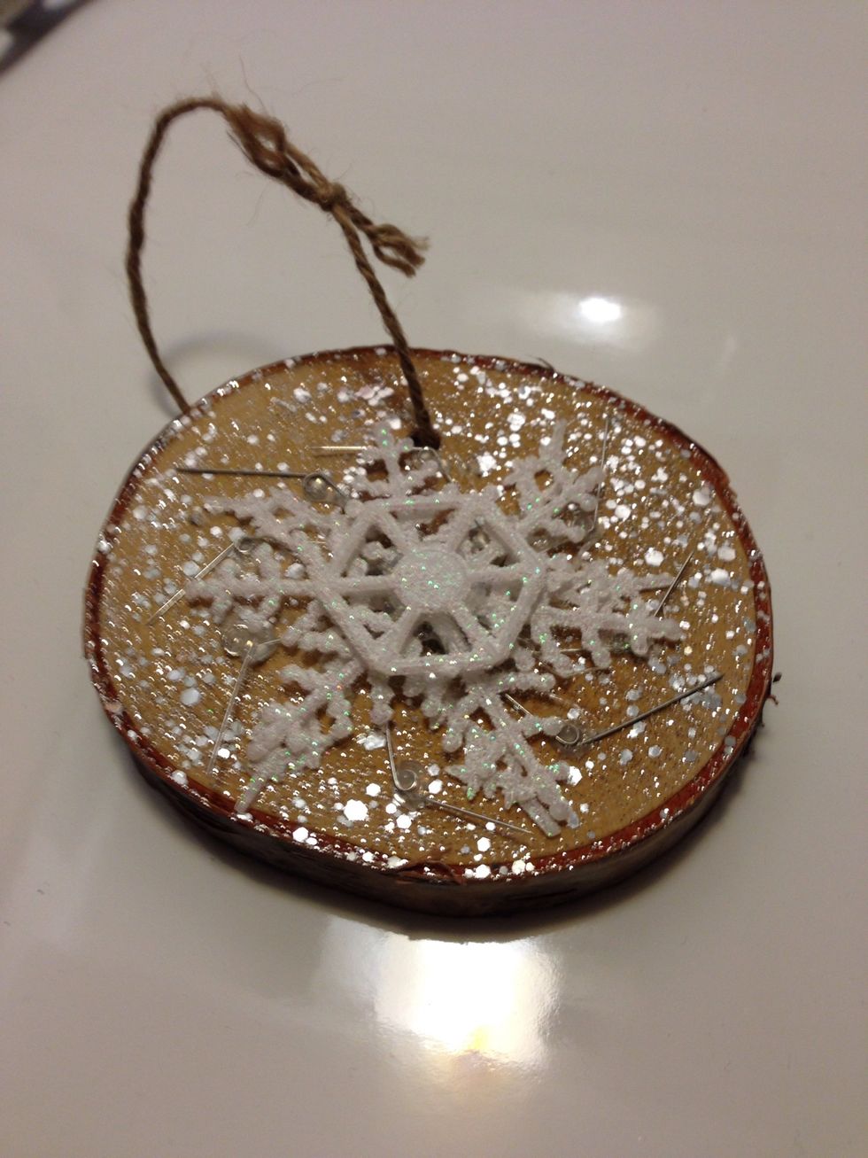 Hot glue on additional decoration.