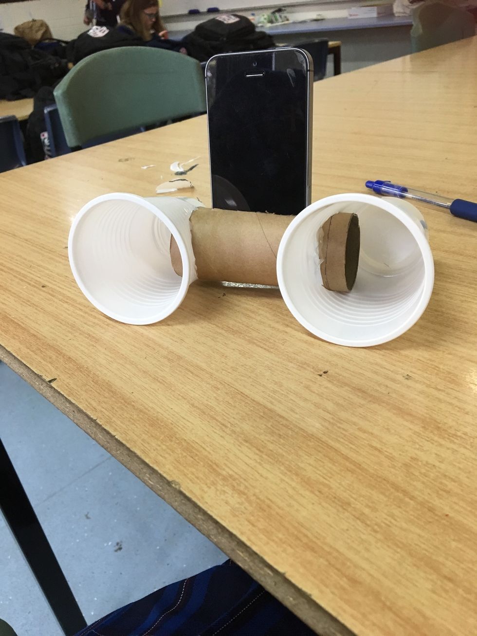 Hot-glue the inside and outside of the plastic cups so they stay in place.