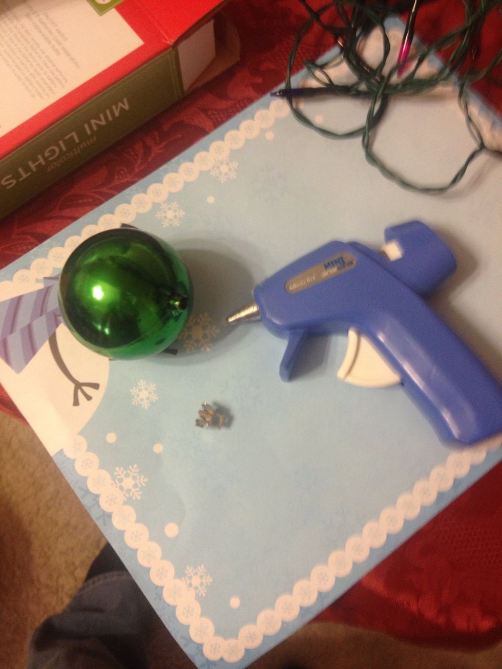 Hot glue the ornaments ends on