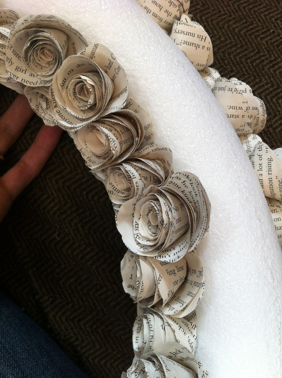 Hot glue the roses to the wreath form nice and tight so no white shows between the roses.