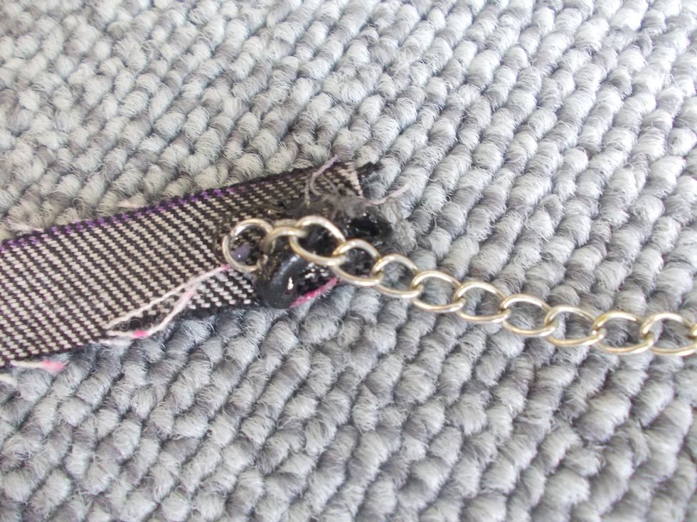 Hot glue to jean cutout.