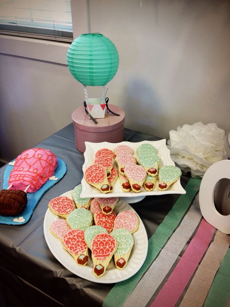 Hot glued candy sticks to the bottom of the box & wrapped with pipe clears to attach the lantern. After several burnt fingers, frazzled nerves, & ripped lanterns, I decided the rest would hang instead