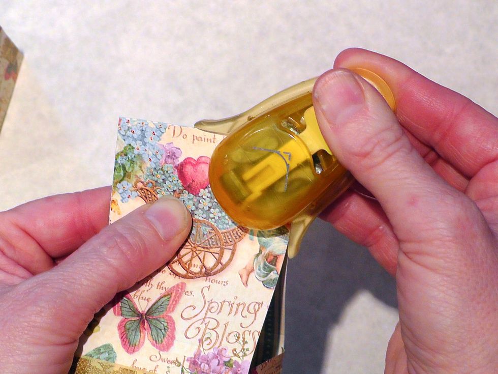 How about corner punching the tops?