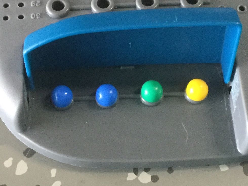 How to Play: First the codemaker makes the code. The code has four colors, and the code could have all of the same colors or all different colors. Then the codebreaker tries to figure out the code.