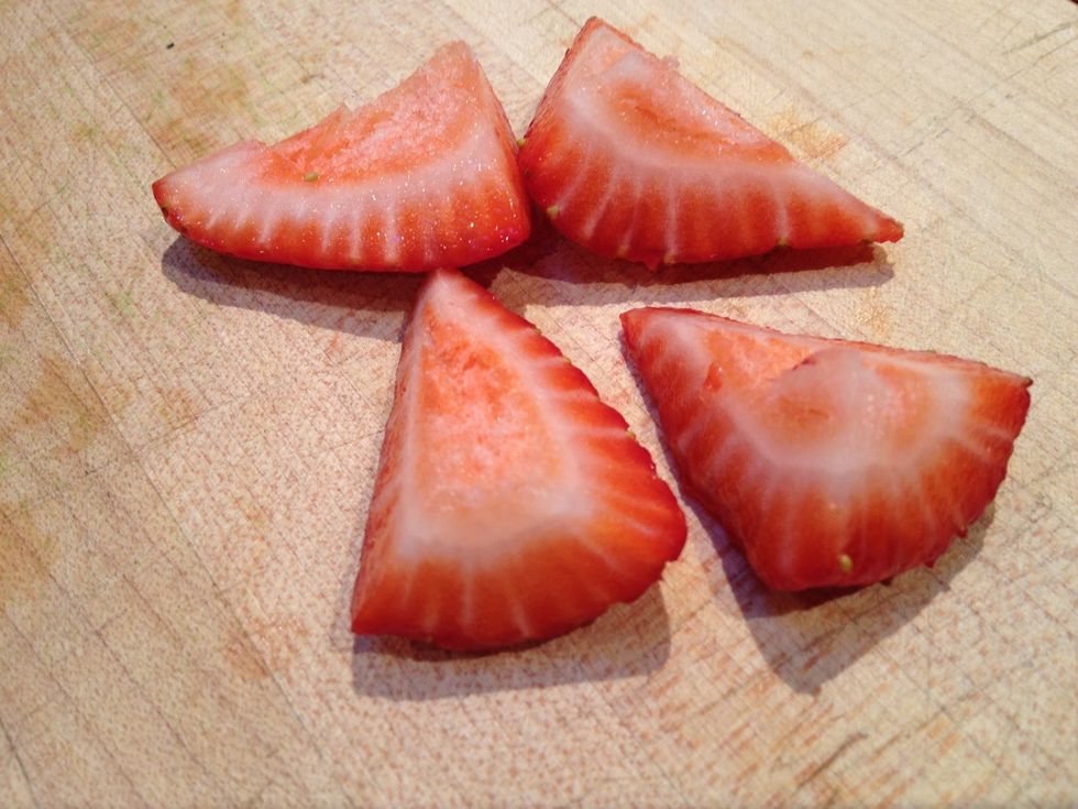 Hull the strawberries, and slice into 1/4 inch pieces.