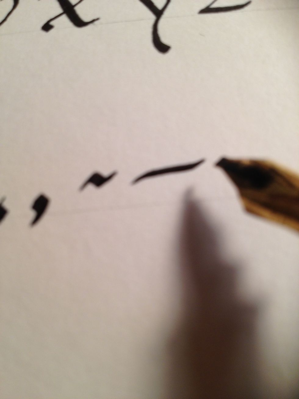 Hyphens are formed by making a straight line with curves at either end.