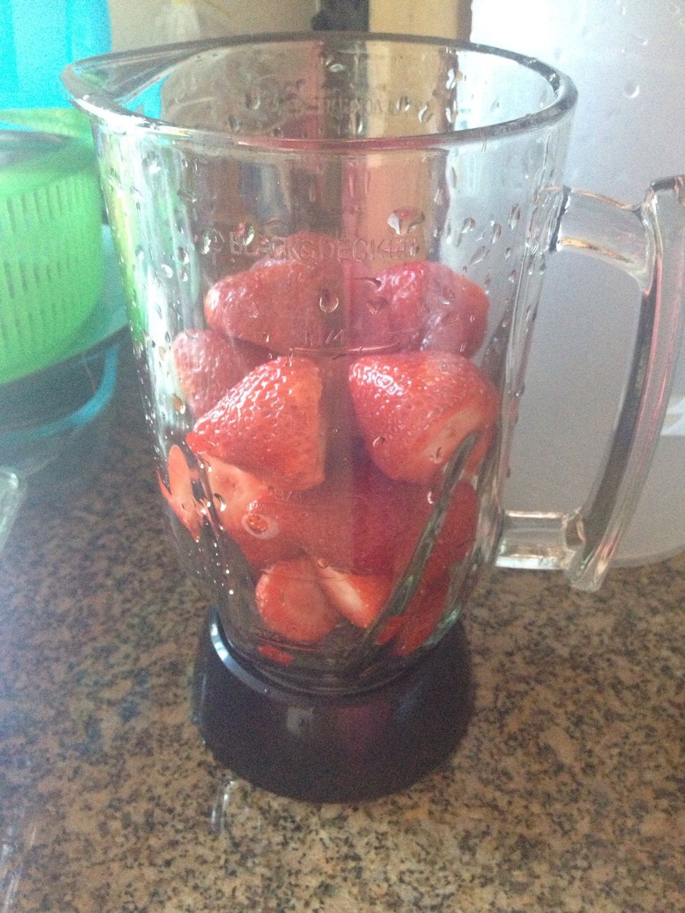 I add about 4-5 cups of strawberries to a blender and put enough water to cover strawberries
