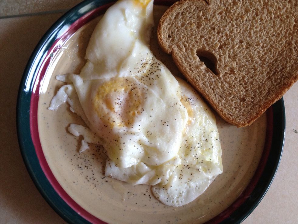 I add salt and pepper and grab my toast and I am ready to eat!